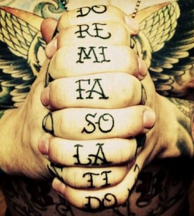Gorgeous fingers  music tattoo