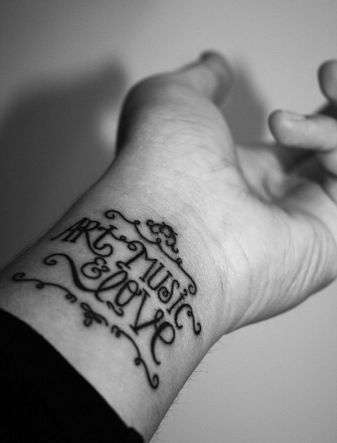 Hands  music tattoo