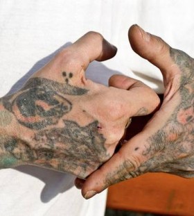 Hands prison tattoos