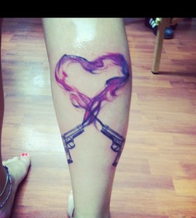 Heart and guns tattoo