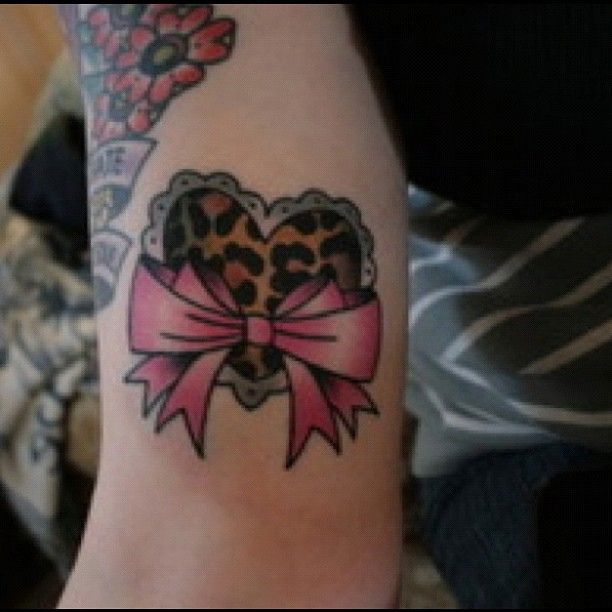 Heart and leopard tattoo