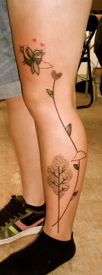 Leg abstract character tattoos