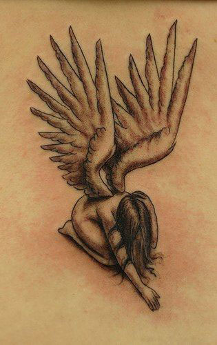Lovely angel wings tattoo