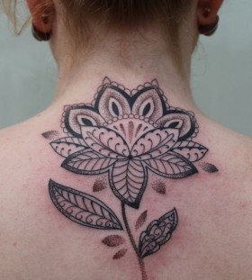 Lovely flower tattoo by Gemma Pariente