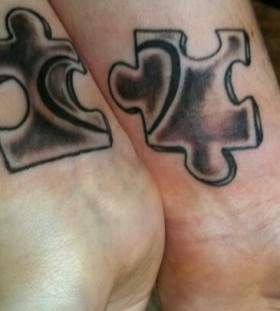 Lovely puzzle tattoo