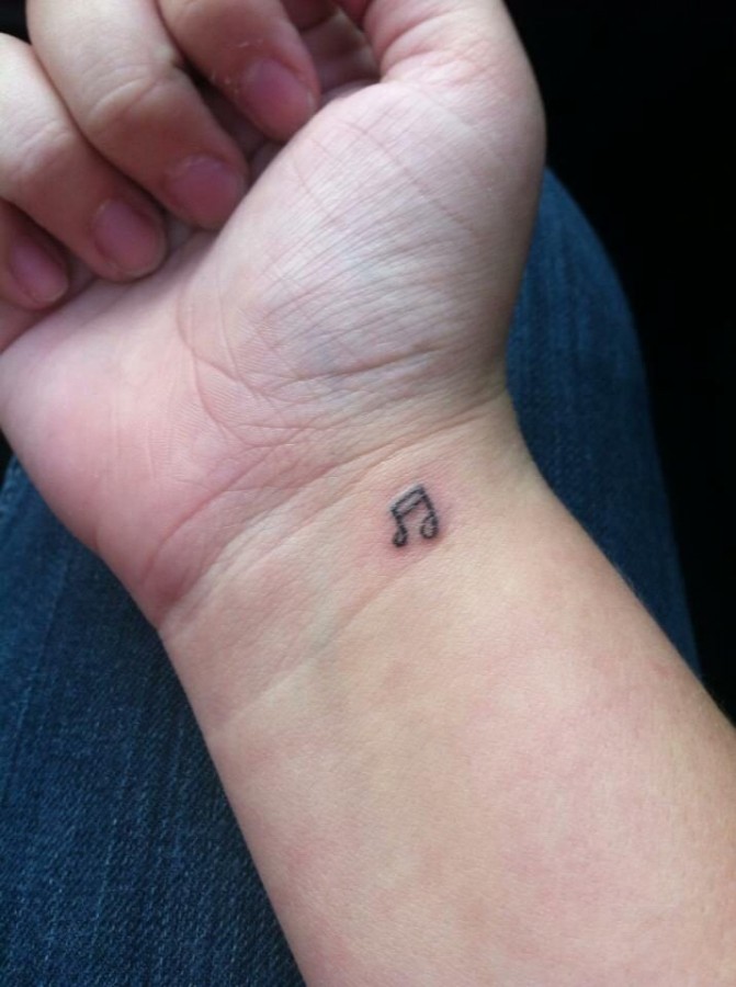 Lovely small  music tattoo
