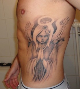Man angel wings tattoo