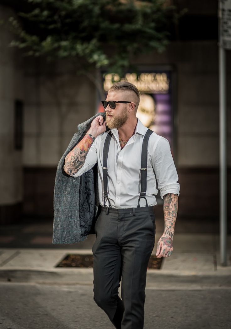 Man with tattoos in a suit - | TattooMagz › Tattoo Designs / Ink Works