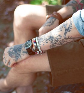 Man with tattoos sitting