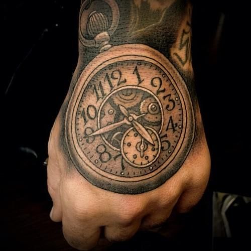 Realistic clock tattoo