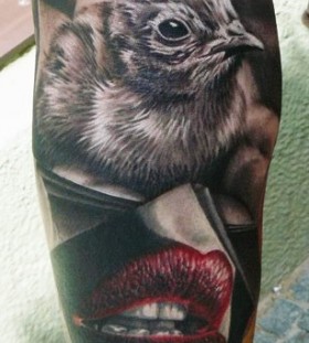 Red lips and bird tattoo by Zhivko Baychev