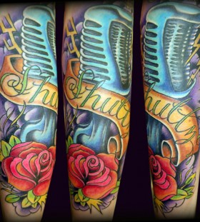 Red rose and  music tattoo
