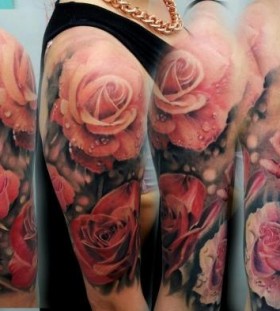 Red roses photorealistic tattoo