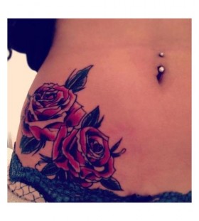 Red rosess hip tattoo