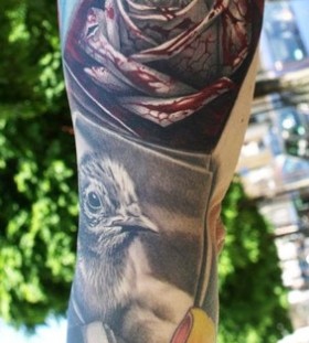 Rose and bird tattoo by Zhivko Baychev