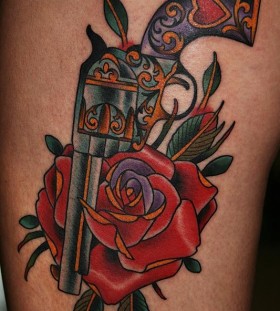 Rose and guns tattoo