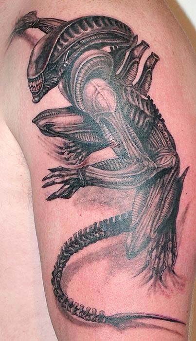 Scary alien tattoo