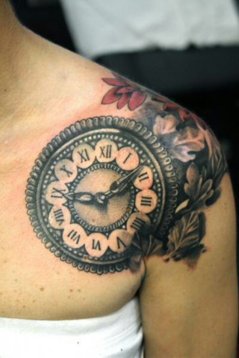 Shoulder clock tattoo