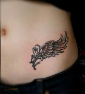 Simple hip angel wings tattoo