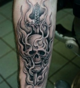 Skull tattoo by Corey Miller