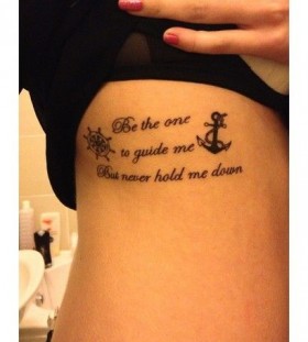 Woman anchor tattoo