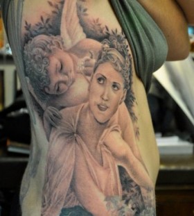Woman tattoo by Corey Miller