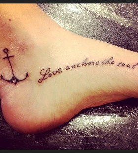 Words and anchor tattoo