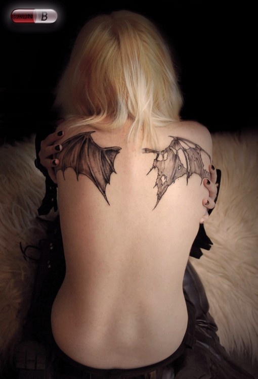 black bat wings tattoo