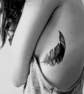 black feather tattoo for girls