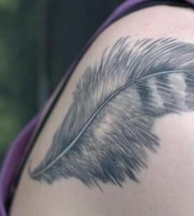 black feather tattoo long