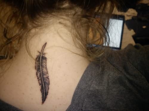 black feather tattoo tiny