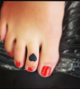 black heart tattoos on the foot