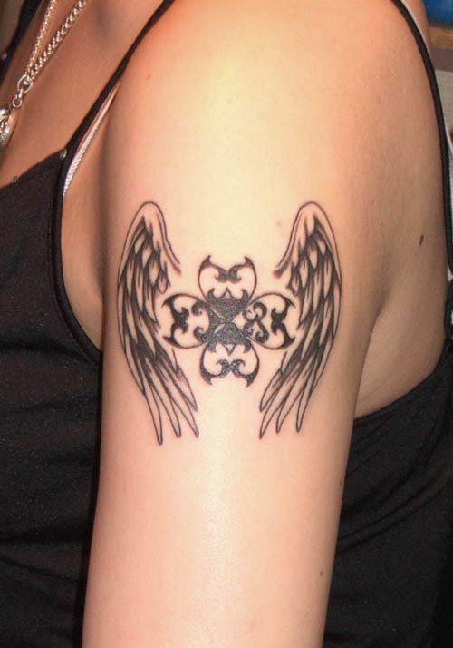 black wings tattoo arm