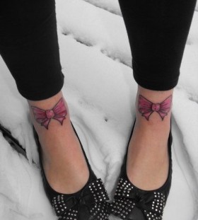 bow tattoos on both feets