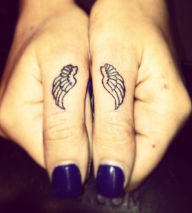 finger tattoo wing