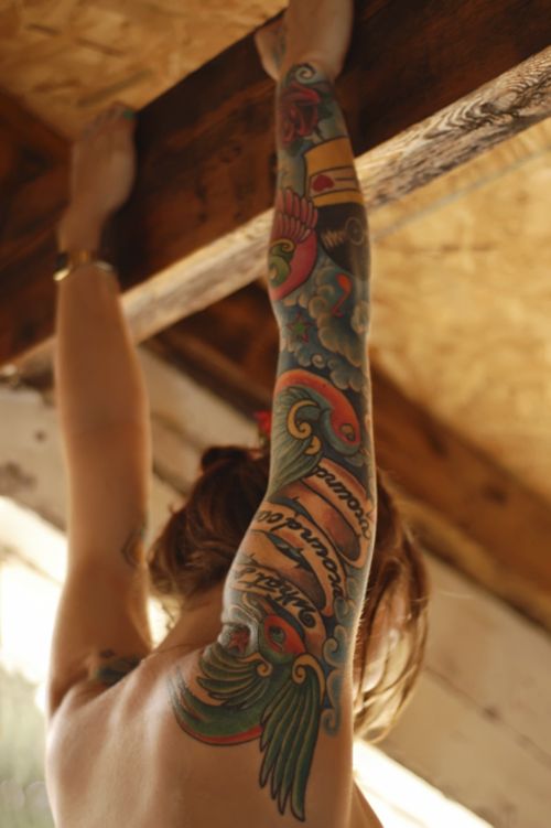 hand tattoo hanging girl
