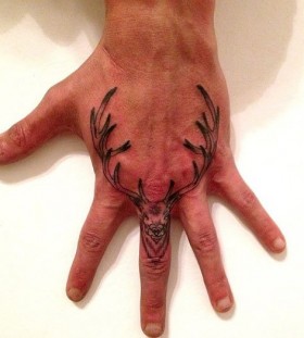 hand tattoo  small aminal