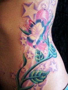 hip tattoo for girl sars and flower