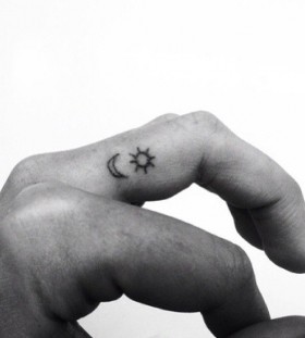 moon tattoo on finger