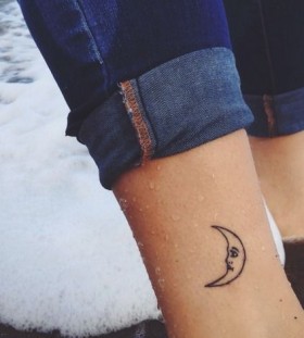 moon tattoo with face