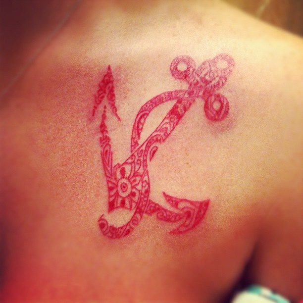 red tattoo all anchors is gorgeous