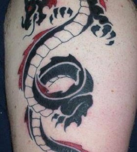 red tribal tattoo dragon