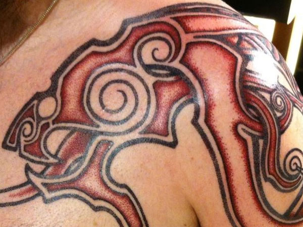 red tribal tattoo ink