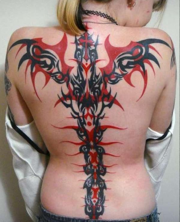 red tribal tattoo spine