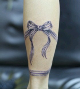 small purple tattoo ballet ballerina bow