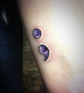 small purple tattoo points
