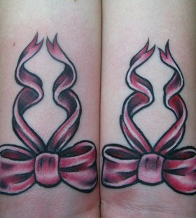 2 bows tattoo