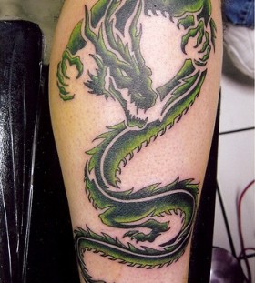 Amazing green dragon tattoo