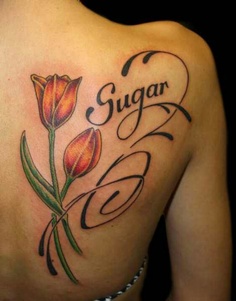 Amazing tulip tattoo on back
