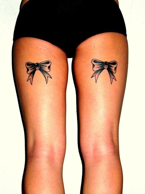 Awesome leg with bows tattoo